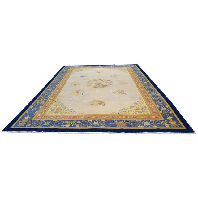 Hand-knotted with care using traditional rug-making techniques, this wool rug blends timeless craftsmanship with a modern...
