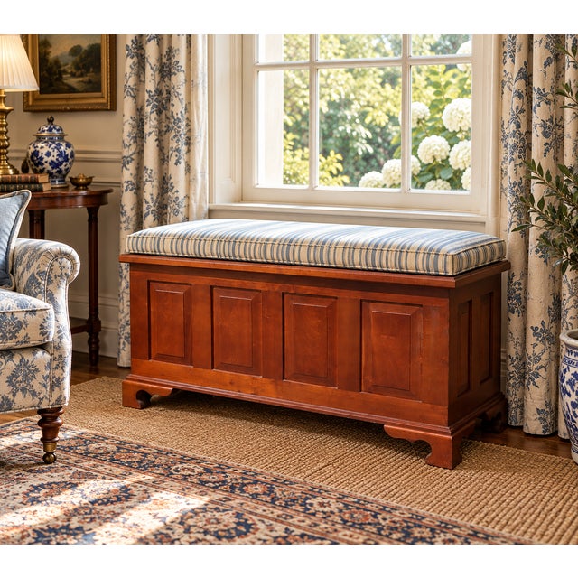 A handsome mid-20th-century American Colonial Revival blanket chest featuring substantial solid wood construction, a warm...