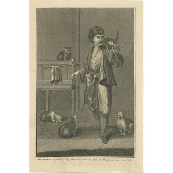 Antique print depicting the Albanian Dgi-Guerdgi feeding cats in the bazaar in Constantinople with sheep liver. This print...