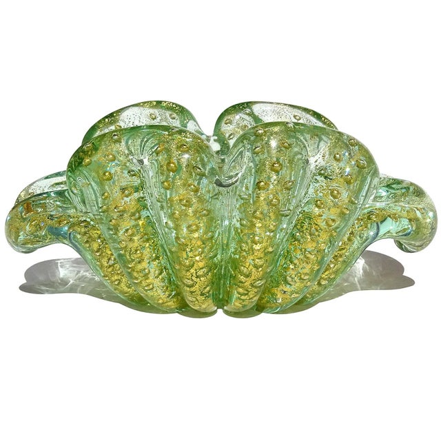Gorgeous vintage Murano hand blown green, bubbles and gold flecks Italian art glass flower form bowl. Documented to...