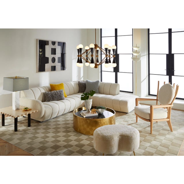 Wash your room in warm ambient light with our Lisbon Torchière. A thick marble base with a polished brass stem and three...