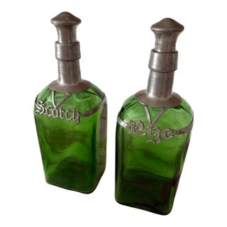 Vintage Green Glass Decanters With Pewter Cage and Stopper - Pair For Sale