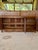 A substantial late 19th-century French Provincial three-door enfilade or buffet, dating to approximately 1880–1900....