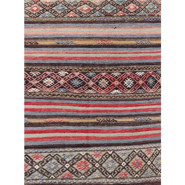 Textile Vintage Turkish Kilim With Horizontal Stripes and Tribal Motifs in Bright Tones For Sale - Image 7 of 11