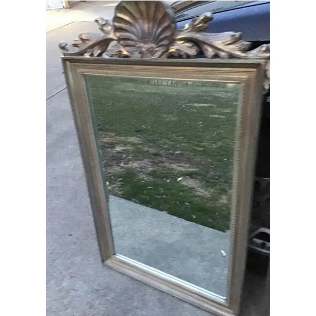Italian French Style Wall mirror Regency style shell clam design at top Antique Gold in color Composition to look like...