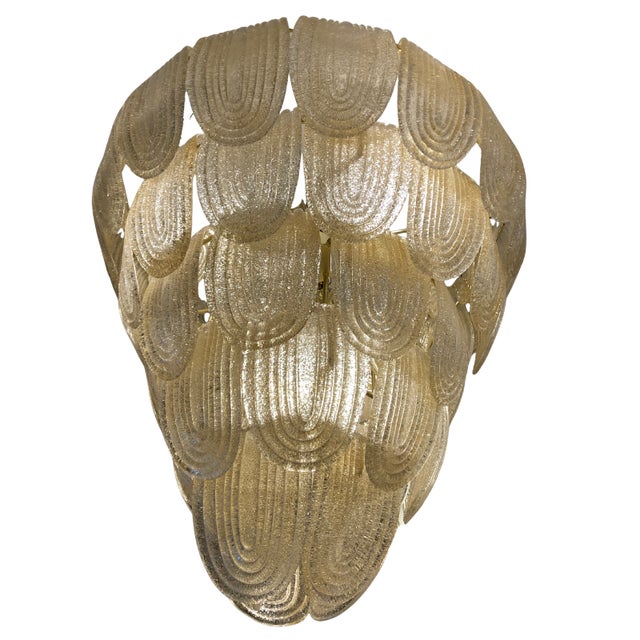 A fantastic Art Deco-style pendant lamp, made up of individual pieces of gilded Murano glass, arranged in tiers to create...