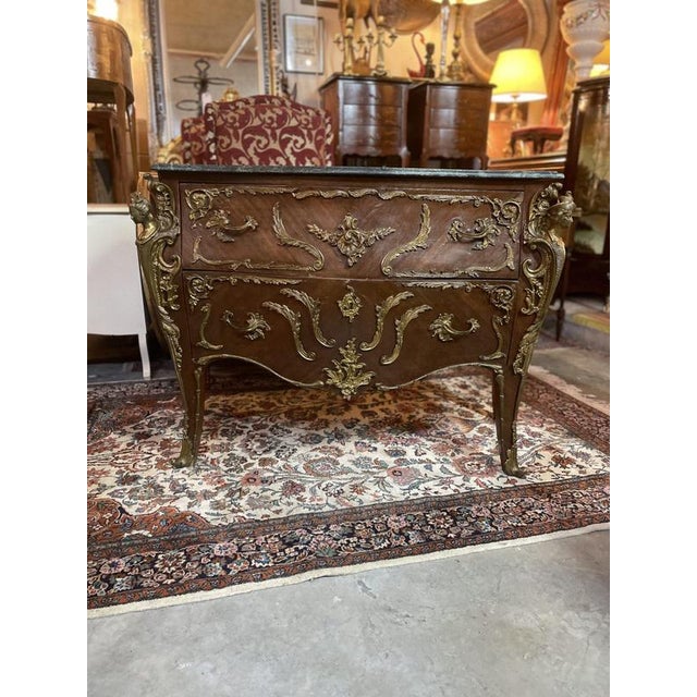 This gorgeous , vintage French chest of drawers is a true showstopper. with its polished wood finish, detailed marquetry,...