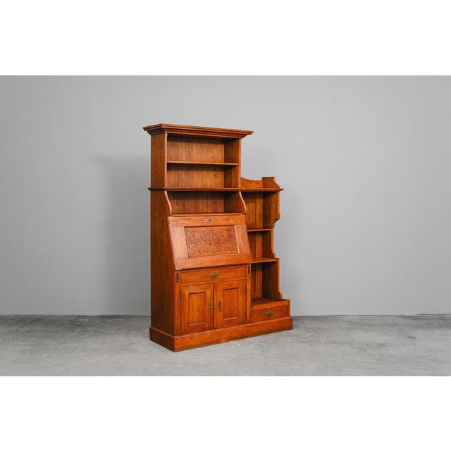 Item: Bookcase with writing desk compartment Period & Style: Art Nouveau - Early 20th century Features - Elegant and...