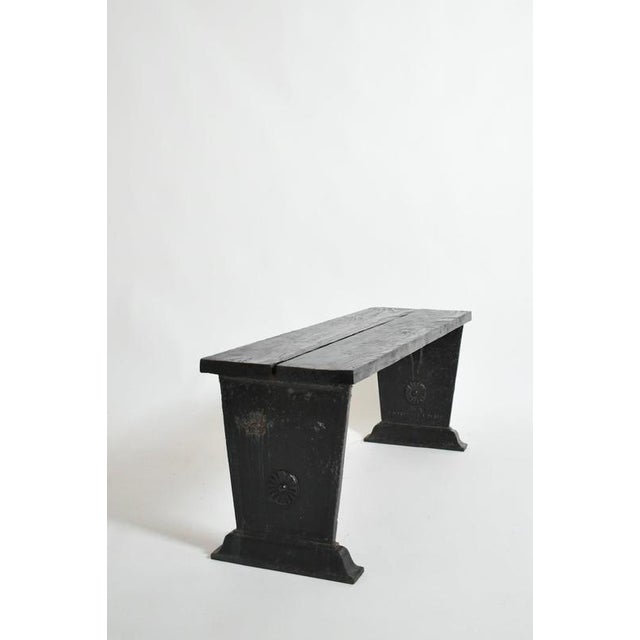 Skoglund & Olson cast iron bench, 1920s. Bench made by Erik Gustaf Skoglund & Axel Olson with a lacquered cast iron base...