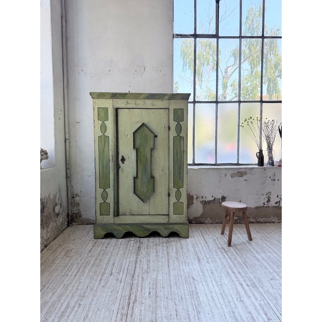 Antique polychrome alsatian wardrobe from the 1800s. with its pine frame, we love its generous size and relatively shallow...
