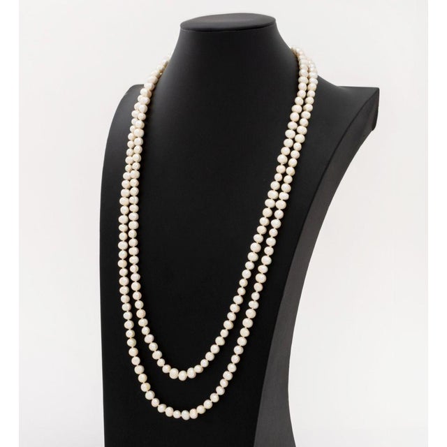 Cultured Drop Pearl Long Necklace, featuring fully drilled round white drop pearls approx. 8.5 x 6.0 mm., well matched for...