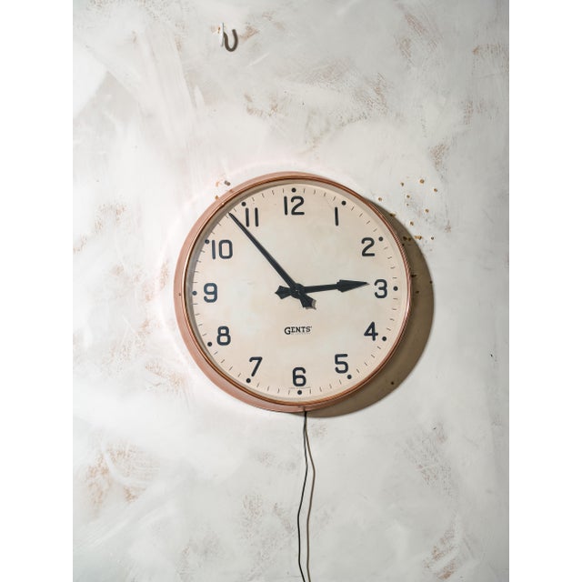 This impressive industrial wall clock was manufactured by Gents of Leicester, renowned for their high-quality station and...