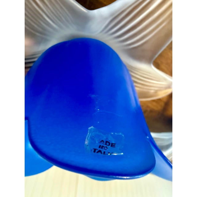 This set features two elegant frosted glass candle holders with a striking blue tulip cup with frosted glass leaves...