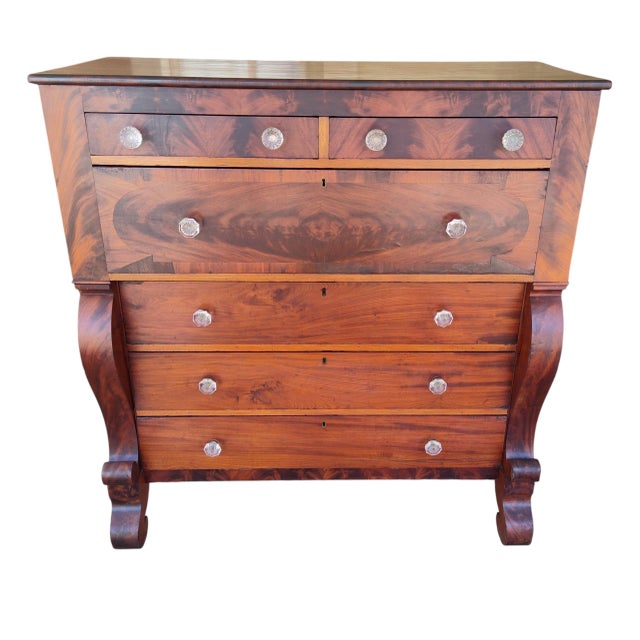 Impressive mahogany chest of drawers with glass pulls from the Empire period, Restored at some point. Circa 1840....