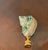 Natures beauty polished in stripes blue mother of pearl turbo sea shell mounted on a brass base lamp finial.
