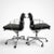 A beautifully restored pair of Eames Aluminum Group Soft Pad Management Chairs, originally designed by Charles and Ray...