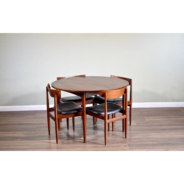 Mid-Century Modern Extending Round Teak Table and Chairs
