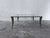 1970s coffee table with a heavy clear glass tabletop and solid brass legs. The table is in excellent condition. The...