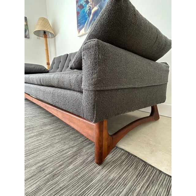 This iconic MCM gondola sofa in the style of Adrian Pearsall boasts a distinctive low profile that looks great from any...