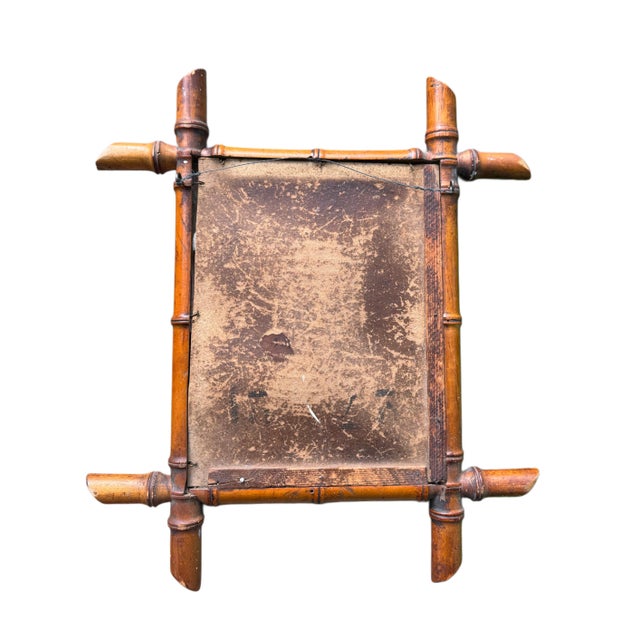 This Antique French Faux Bamboo Mirror brings timeless elegance to your hallway or gallery wall. Its expertly crafted faux...