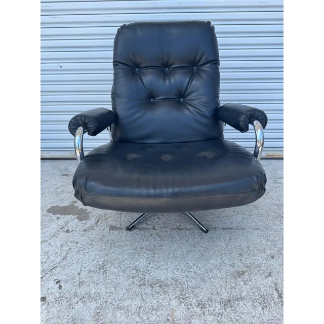 This chair has the easy gliding system. Its made by the German company Lubra. It has lots of polished chrome and button...