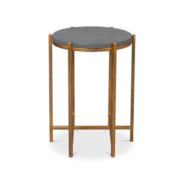 Where contemporary design meets sophisticated luxury. The table features a stunning leather-wrapped shagreen embossed...
