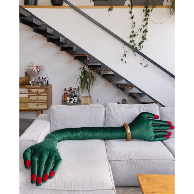 Add a touch of whimsy and charm to your home with this handmade green hand shaped pillow. Crafted with care from high...