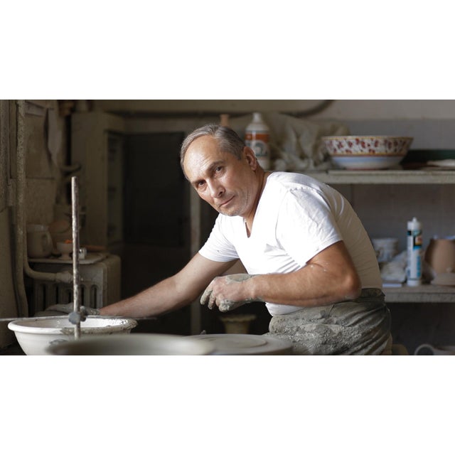 DESCRIPTION This simplified Antico Deruta dinnerware is characterized by a light gray glaze and a hint of deep blue...