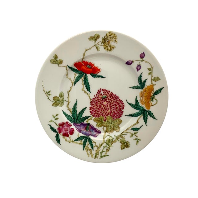 The Limoges Small Dessert Plate 6.5 Set of 4 by Raynaud & Co. is a vintage French collection featuring a floral design....