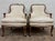 This is a gorgeous pair of vintage, likely antique, French Provincial Louis XV style carved armchairs or Bergere with tan...