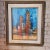 A captivating vintage MCM (Mid-Century Modern) oil painting featuring a vibrant, geometric cityscape signed by Jacques...