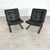 Dimensions: H 30” x W 24.5” x D 28” x SH 17.5” Pair of Vintage Scandinavian teak Kengu-chairs in black leather designed by...