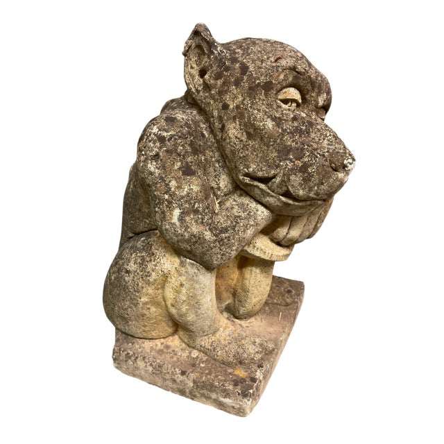 Embrace a touch of gothic mystery and classic European charm with this striking vintage cast stone gargoyle statue....