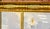 Ornate 19th-century American Federal-style overmantle mirror is constructed from giltwood with a gold finish. This triple-...