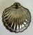 Here is a circa 1920s English silver-plated clamshell butter dish by E & J Leek. Beautifully sculptural, the hinged dish...