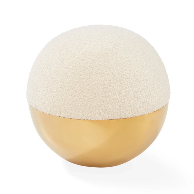 Futuristic Reflection. Minimalist and modern, a simple dot to punctuate your place: A honed brass base topped with an...