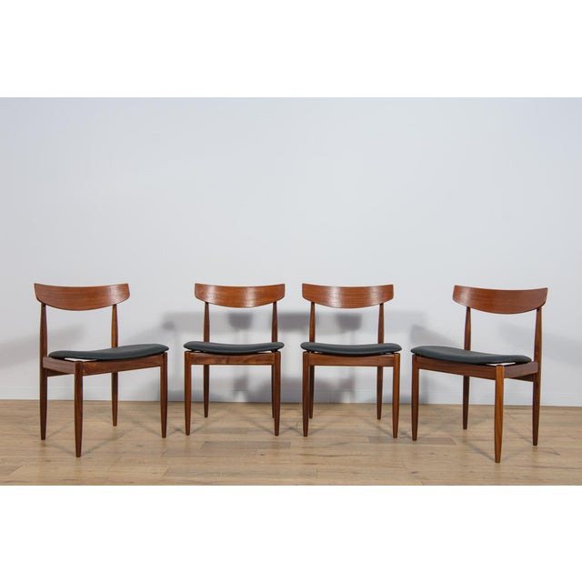 This set of four dining chairs was produced by G-Plan in the United Kingdom circa 1960. It was designed by I. Kofod-...