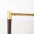 Stunning brass and wood lamps with adjustable shades, dating from the 1970s-1989. Equipped with a switch on the base,...