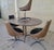 Space-Age, Mid-Century Modern "Star Trek" style 5 piece dinette set. Four swivel chairs and an oval dining table. (no...