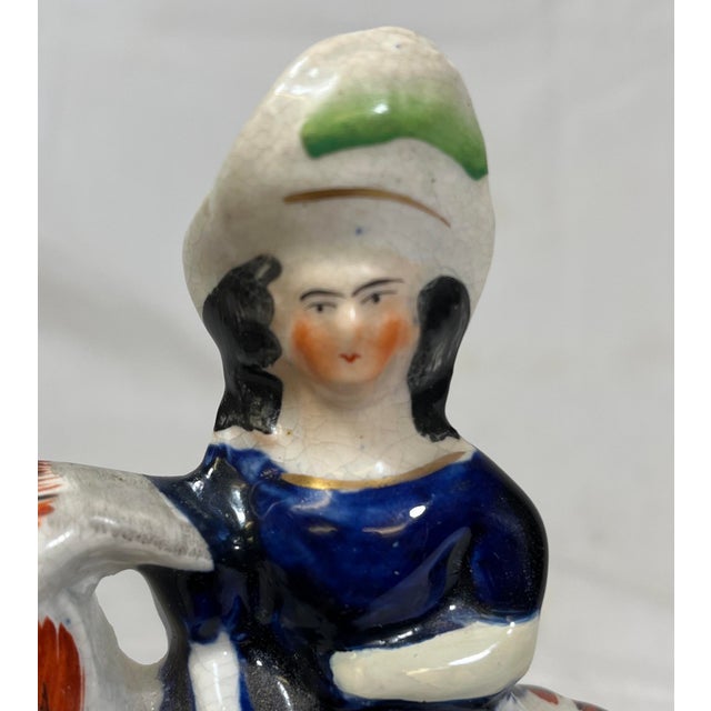 White Antique Pair of 19th Century Staffordshire Figurines Depicting Period Dressed Women Riding Goats - From England For Sale - Image 8 of 11