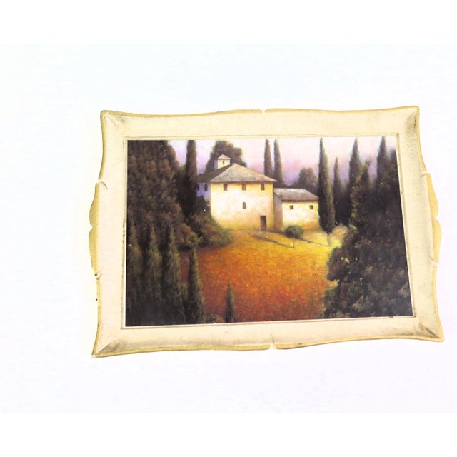 This tray is a beautiful example of Italian imports in the 1970s. The tray depicts a painted Italian forest, fields, and...