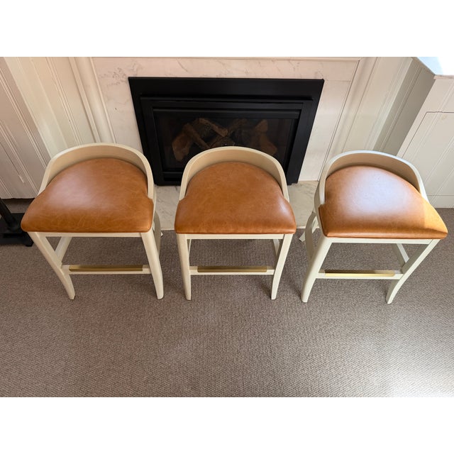 Brown Custom Counter Stools by Jessica Charles — Toffee Leather, Antique White Frame, Brass Footrest (Set of 3) For Sale - Image 8 of 10