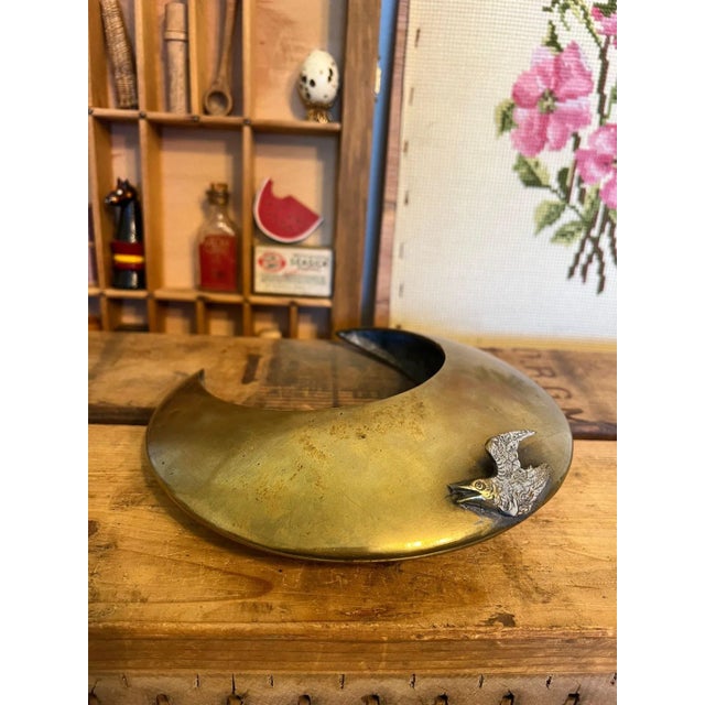 Brass material not confirmed. MCM style. Art deco. Could be used as a small planter. Dimensions: 7"L 7.5"H2"W