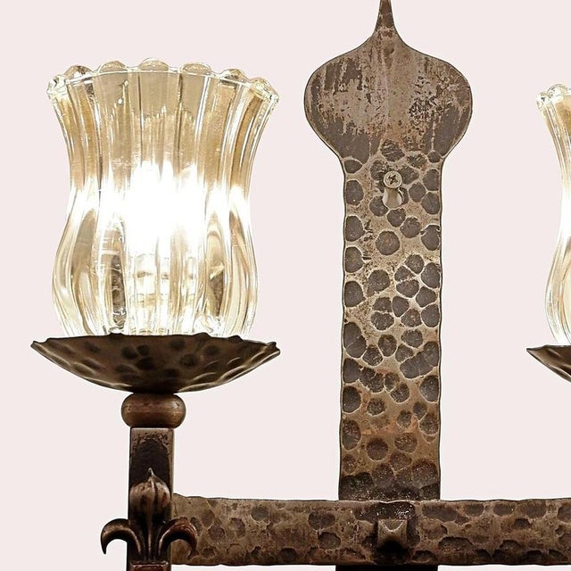 Pair of wrought iron 2 branch wall sconces Wear consistent with age and useMeasures : 33cmx19cm H:43cm Materials : wrought...