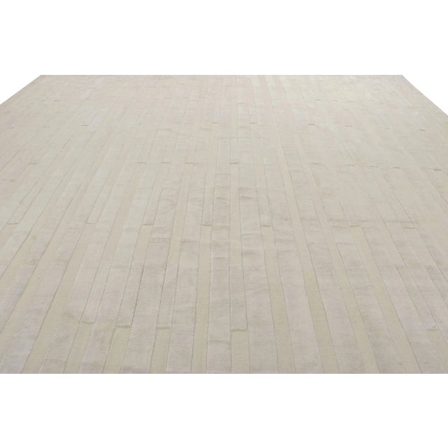 Made with hand-knotted silk, this 9x12 contemporary rug is a rich new addition to Rug & Kilim’s Textural rug...