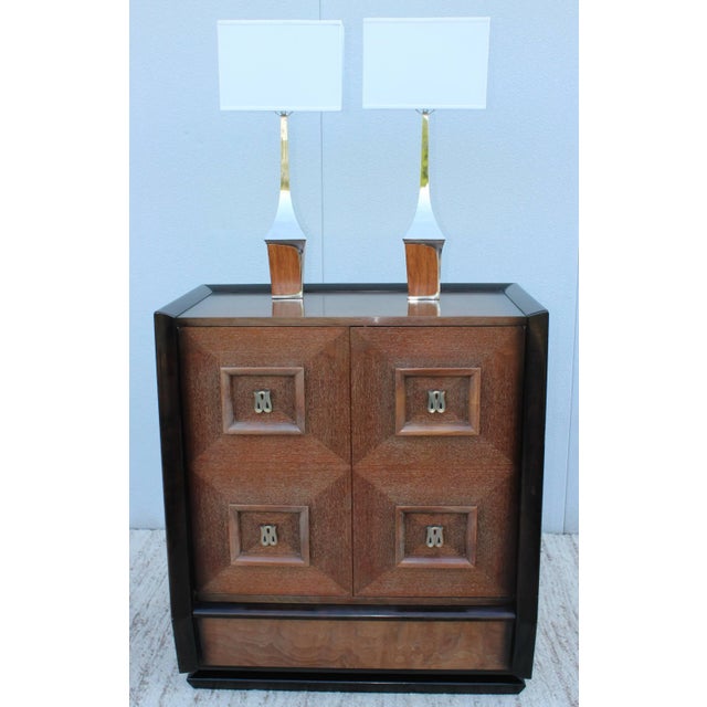 1960s modern chrome and walnut table lamps by Laurel, newly rewired and ready to use. Shades for photography only. Height...