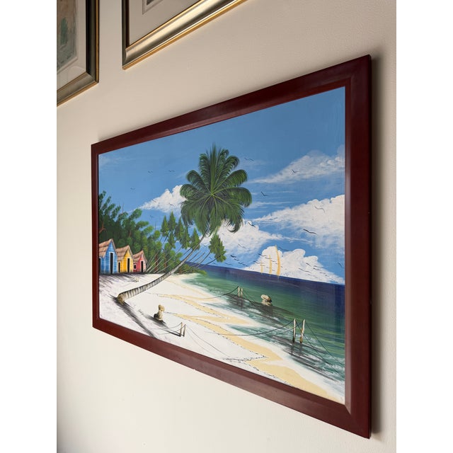 Beautiful large vintage Haitian coastal impressionist oil on canvas painting depicting a vibrant tropical beach scene with...