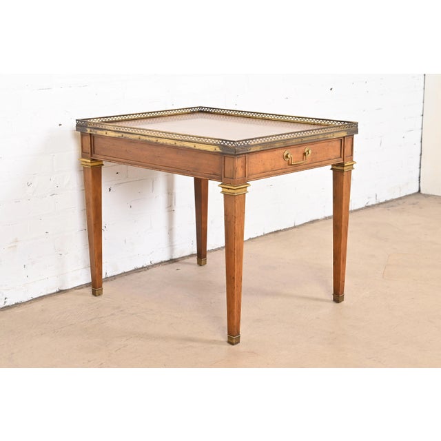 A gorgeous Neoclassical or French Regency Louis XVI style tea table or occasional side table By Baker Furniture USA, Circa...