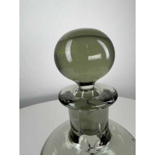 Classic Danish “Kluk Kluk” decanter, also known as a Glug Glug decanter, made from thick smoked glass. The distinctive...