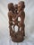 Extraordinary carved wood sculpture of African Tribal Males. Highly detailed on every aspect of the figures. The sculpture...